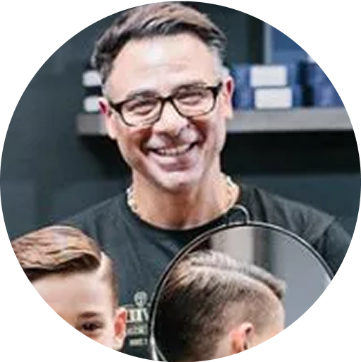 David, kids barber at Davilia Barbershop